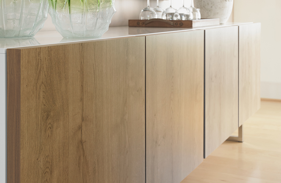 Elegant in form, this modern credenza warms the space by using Formica® Laminate (HPL) 9312 Planked Urban Oak on the doors. cabinet doors, furniture doors, laminate doors, wooden doors, wood look doors
